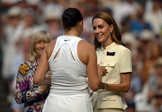 Catherine, Princess of Wales, presents Amanda Anisimova of United States with the Ladies' Singles runner up trophy