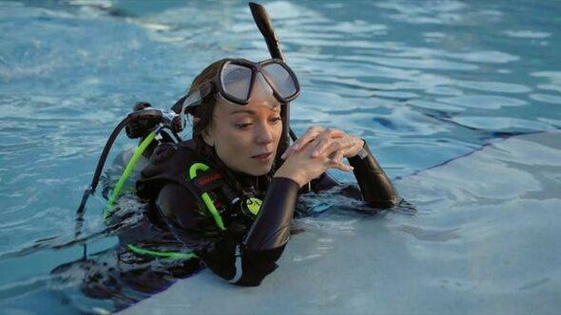 Helen George in water