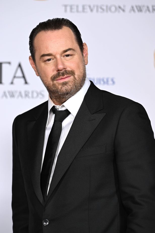 Photo of actor Danny Dyer, wearing a black tuxedo, posing for the cameras from the red carpet at the 2024 BAFTAs in London
