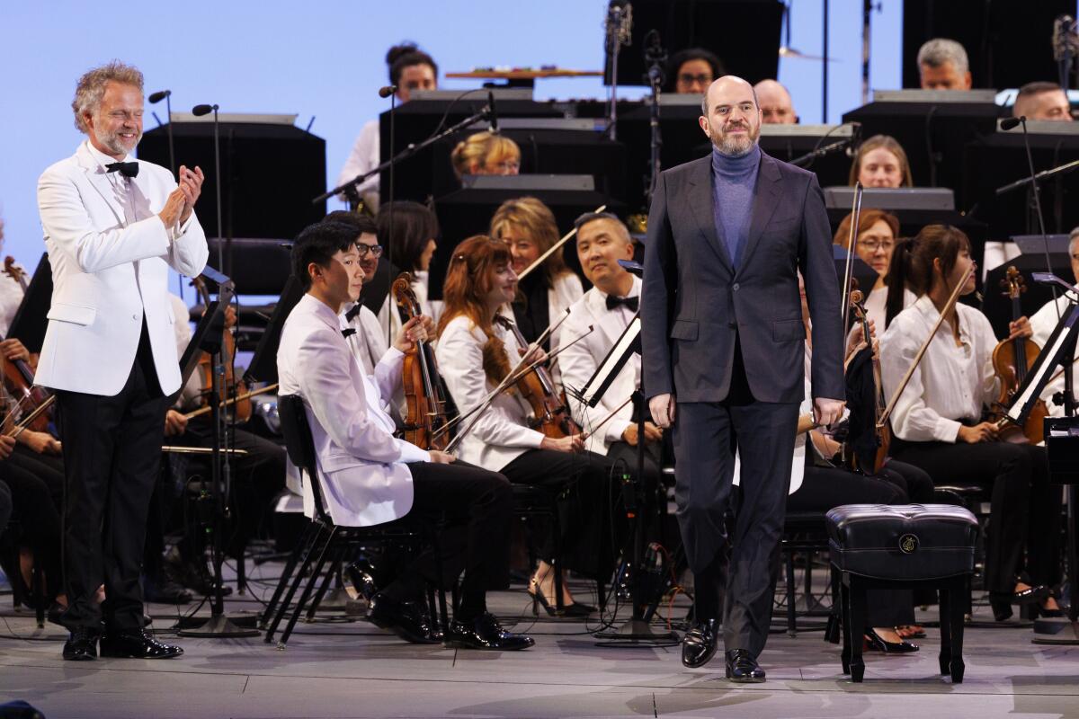 Conductor Thomas Sondergard, left, and pianist Kirill Gerstein on opening night of the L.A Phil at the Hollywood Bowl.