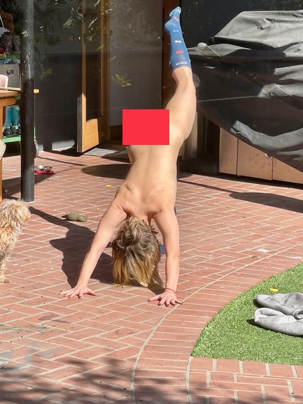 Dax posted this picture of Kristen doing naked yoga to celebrate her Emmy nod
