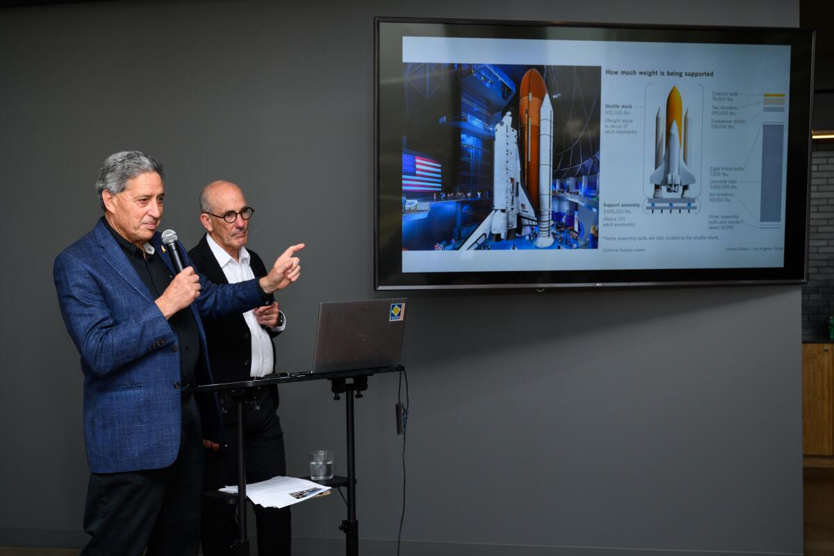 California Science Center CEO and President Jeff Rudolph, left, and ZGF Architects Partner Ted Hyman speak.