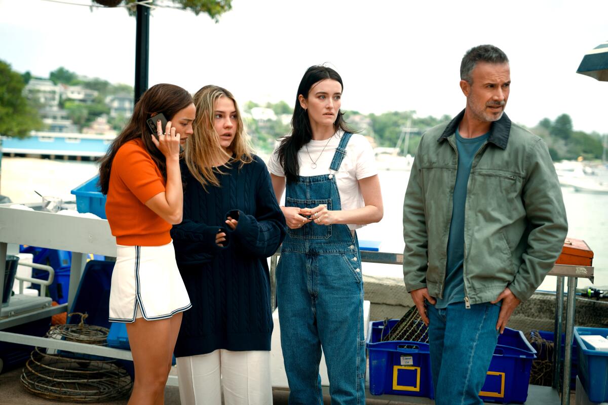 Chase Sui Wonders, Madelyn Cline, Sarah Pidgeon and Freddie Prinze Jr. star in I KNOW WHAT YOU DID LAST SUMMER.