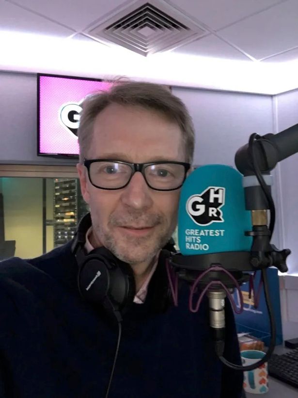 Andy pictured with mic