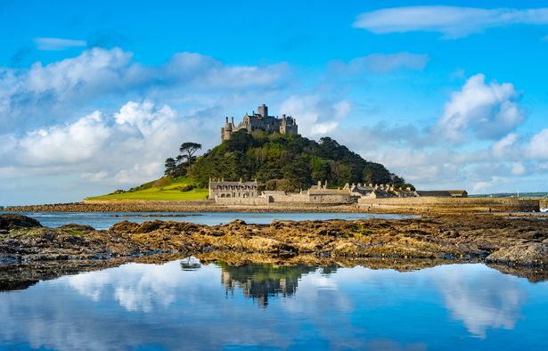 Low Angel View with Rock Pools and Reflections at Low Tide
