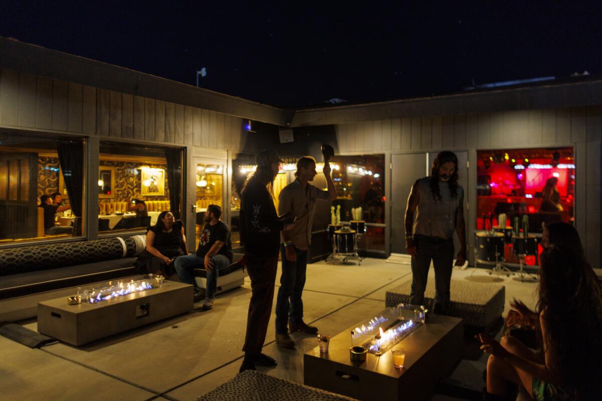  Patrons gather in the outdoor patio adjacent to the nightclub at Mojave Gold.
