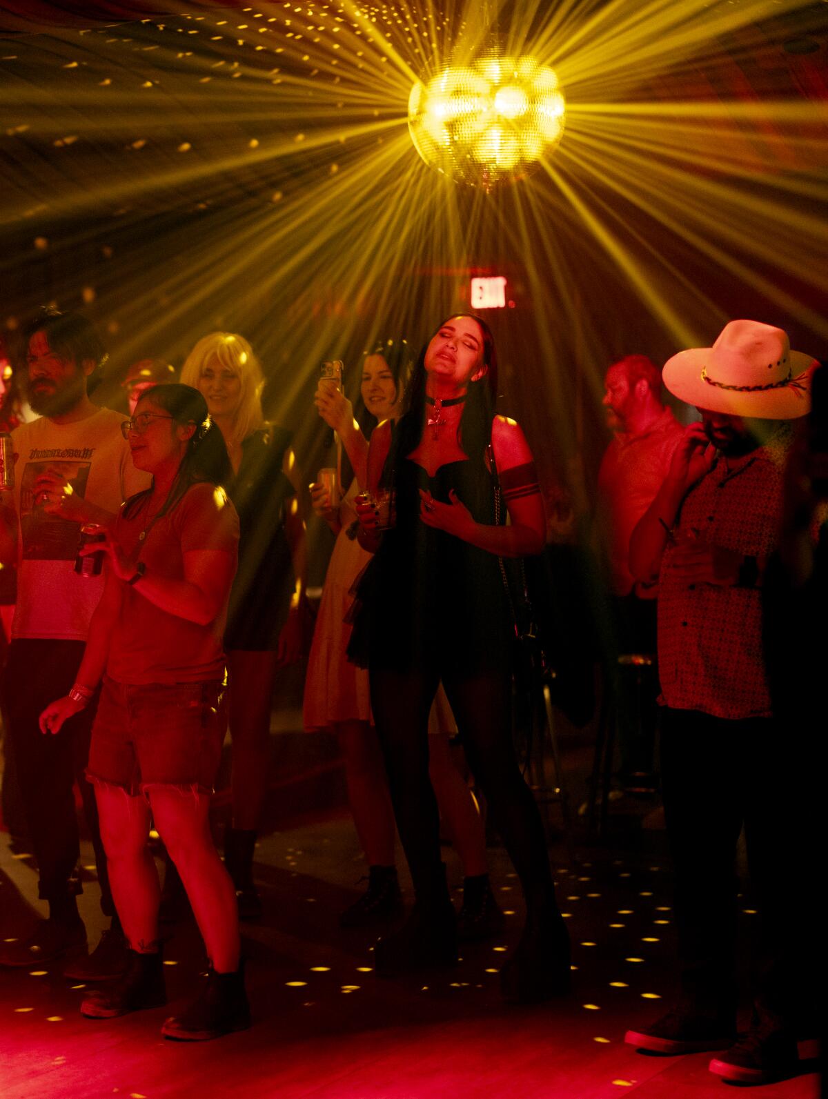 Patrons dance to music at the new Mojave Gold music venue.