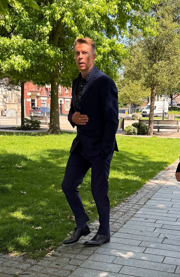 Rick Beardsell, British sprinter and Dragons' Den winner, outside a courthouse.