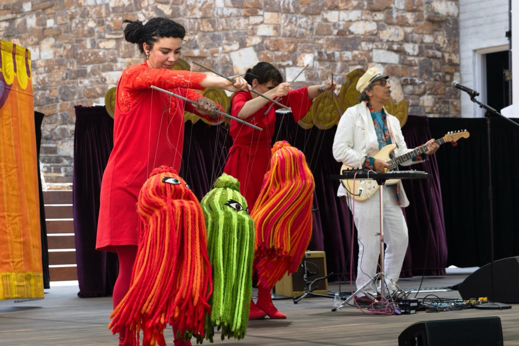 Bob Baker Marionette Theater Puppeteers perform with colorful jelly fish alongside Kid Congo Powers at The Ford Theater 