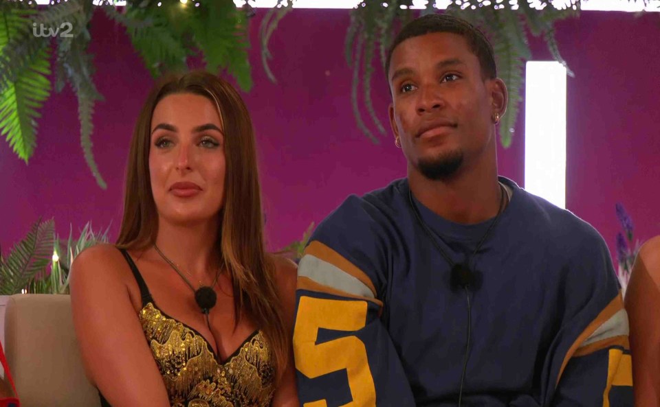 Love Island contestants sitting together.