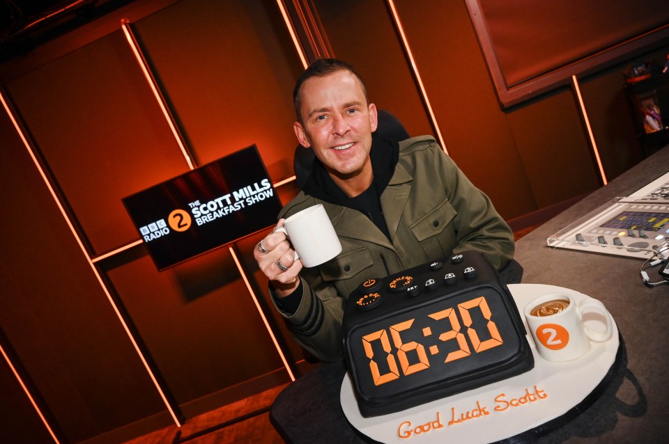 Scott Mills with a clock cake for his new BBC Radio 2 Breakfast Show.