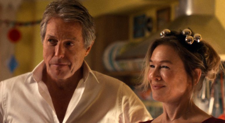 This image released by Universal Pictures shows Hugh Grant, left, and Renée Zellweger in a scene from "Bridget Jones: Mad About the Boy." 