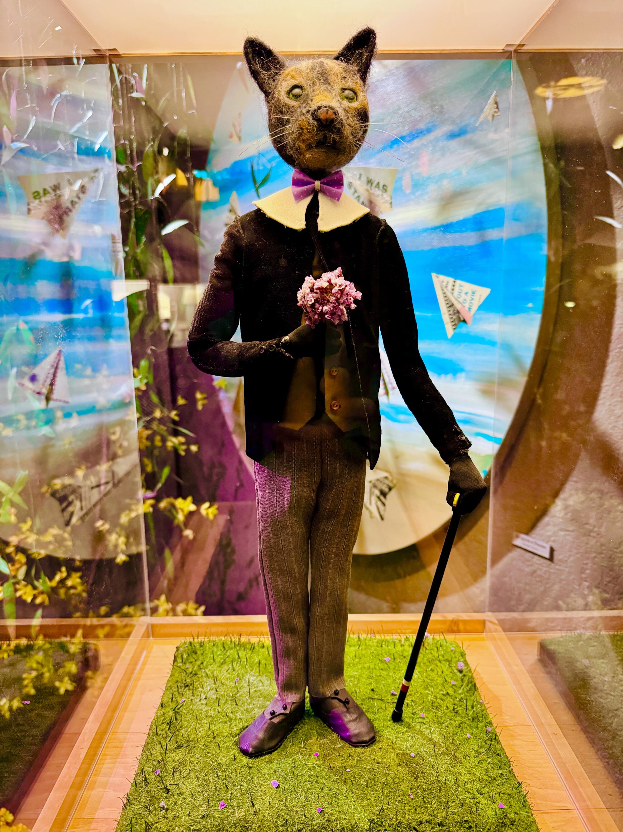 Fantastical puppets made of ceramic and felt dot the landscape inside the Museum of Make Believe.