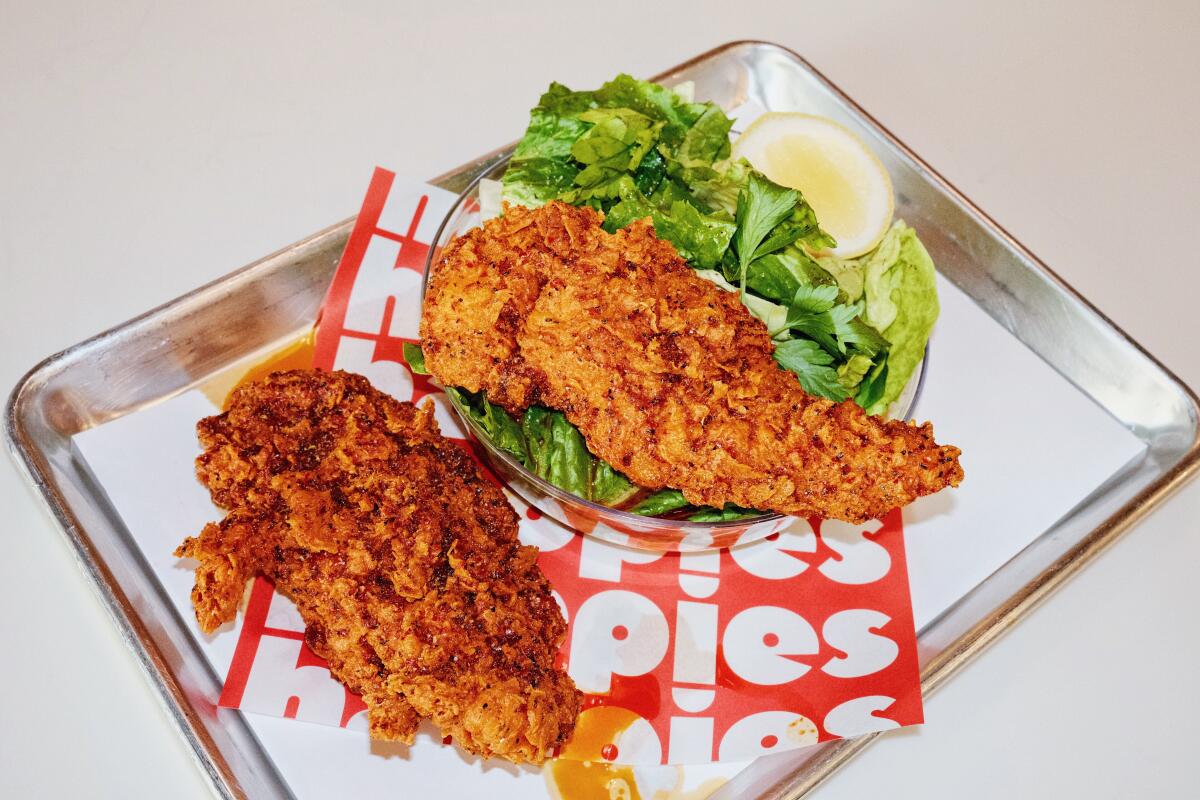 Chicken tenders with salad in anchovy vinaigrette at Joshua Skenes' Happies Handmade.