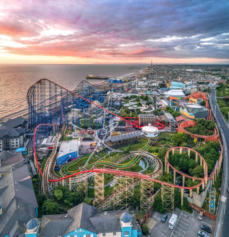 Aerial view of Blackpool Pleasure Beach at sunset.