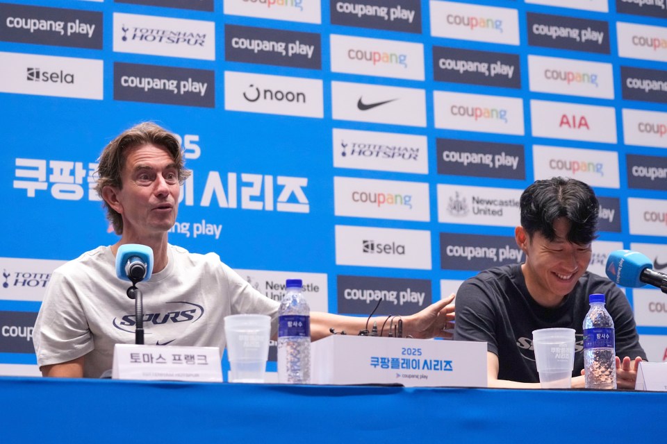 Tottenham Hotspur's coach Thomas Frank and Son Heung-min at a press conference.