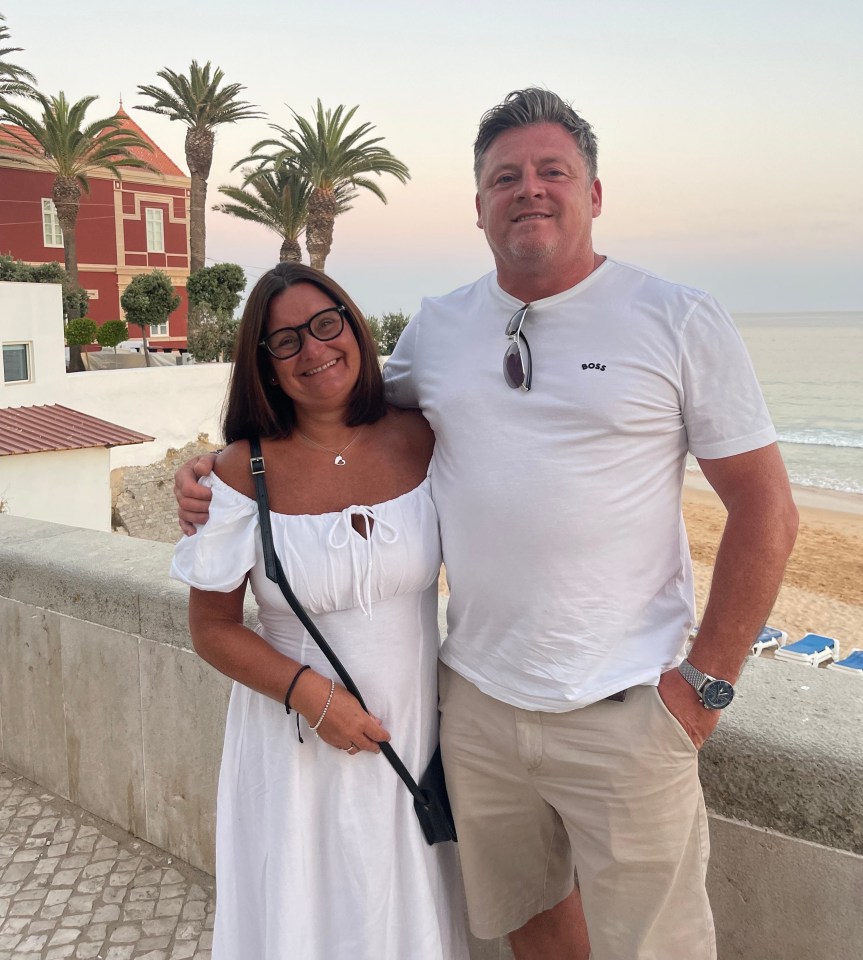 Couple posing for a photo on vacation.