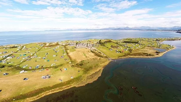 Shell Island has causeway access and is cut off by tides twice a day. Usually its fields are green and inviting