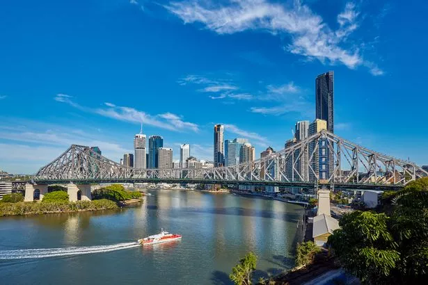 River with the Central Brisbane District in background and the story bridge behind 