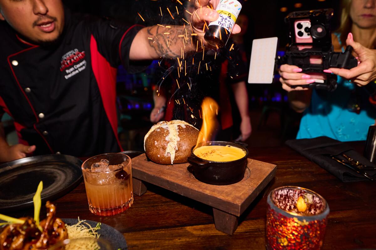 A bread bowl with bourbon-laced cheese. 