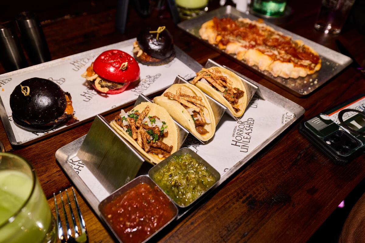 Tacos, mini-burgers and a flatbread.