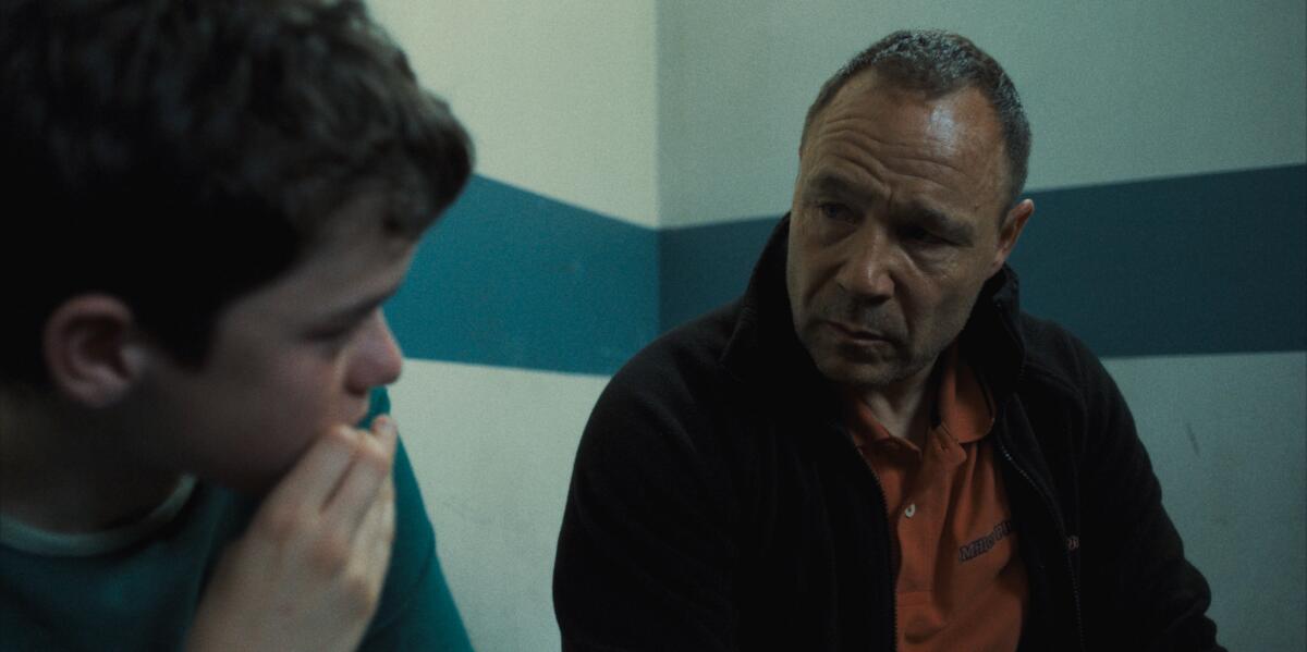 Owen Cooper, left, and Stephen Graham in "Adolescence."