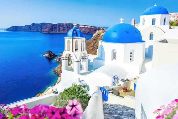Oia, Santorini is a picturesque village perched on the cliffs of Greece’s famed volcanic island.