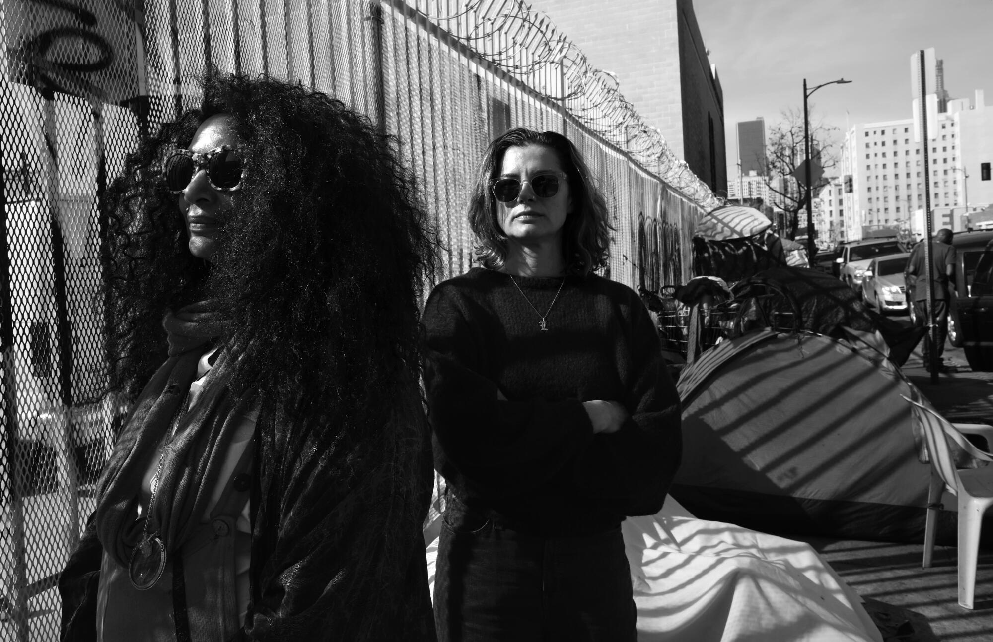 Author Ivy Pochada and writer/activist Linda Leigh in Skid Row in Los Angeles.