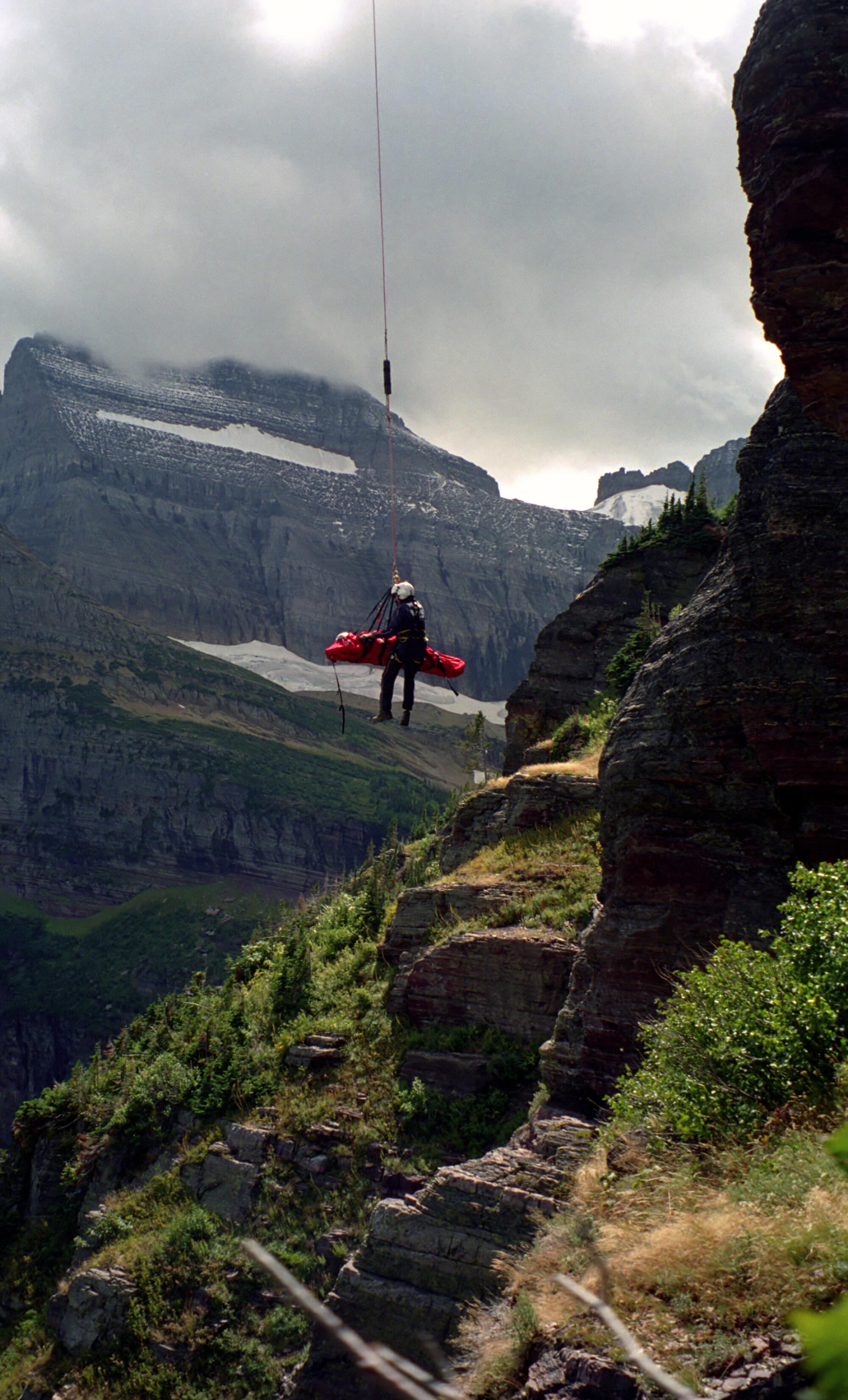 Johan Otter is airlifted from the Grinnell Glacier Trail with medic Jerry Anderson.