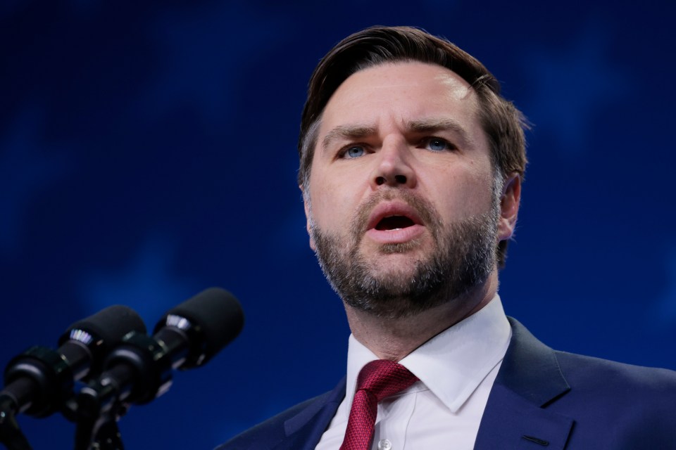 J.D. Vance speaking at a podium.