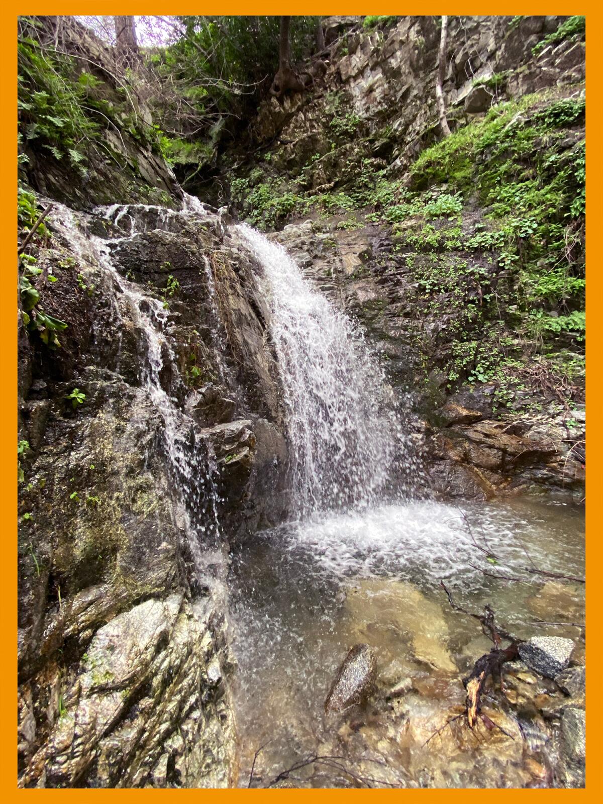 Waterfall in a green alcove.