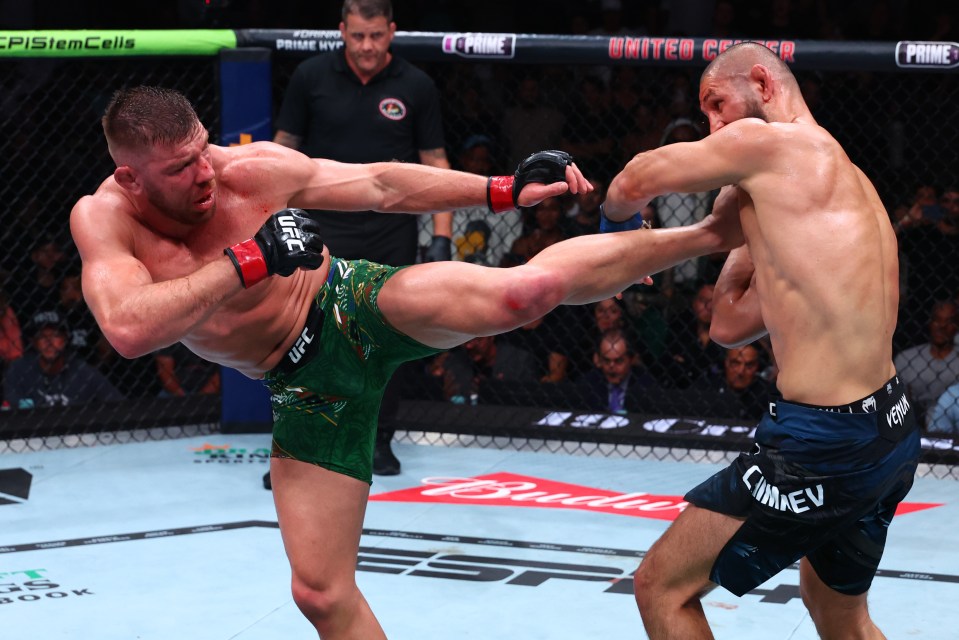Dricus du Plessis kicks Khamzat Chimaev in a UFC match.
