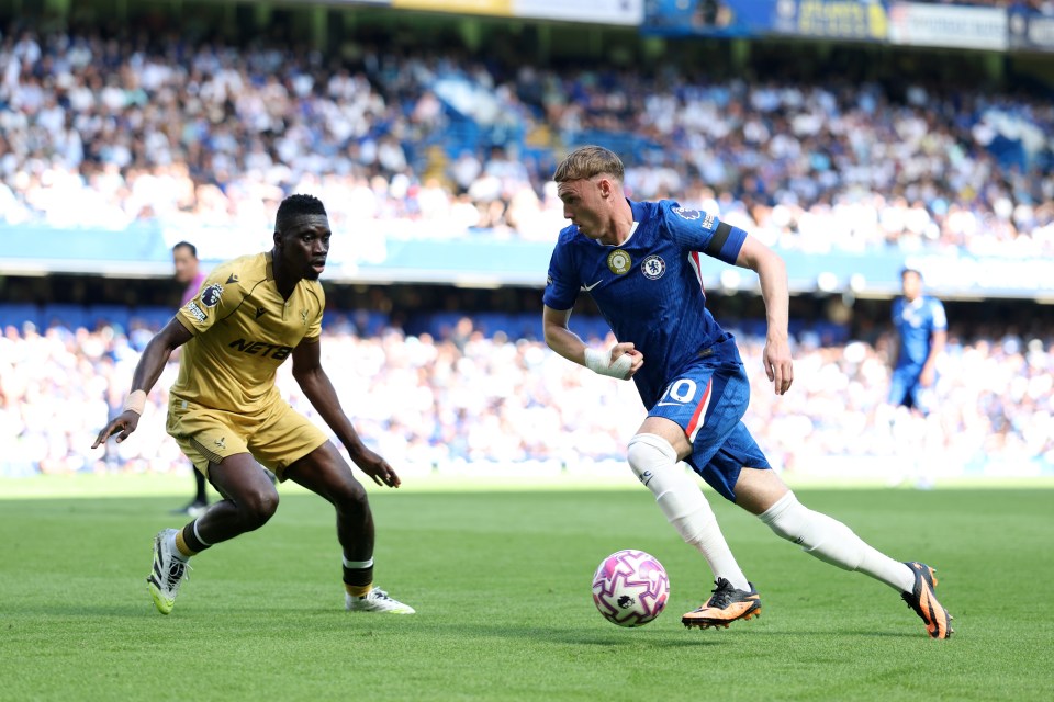 Cole Palmer of Chelsea controls the ball during a Premier League match.