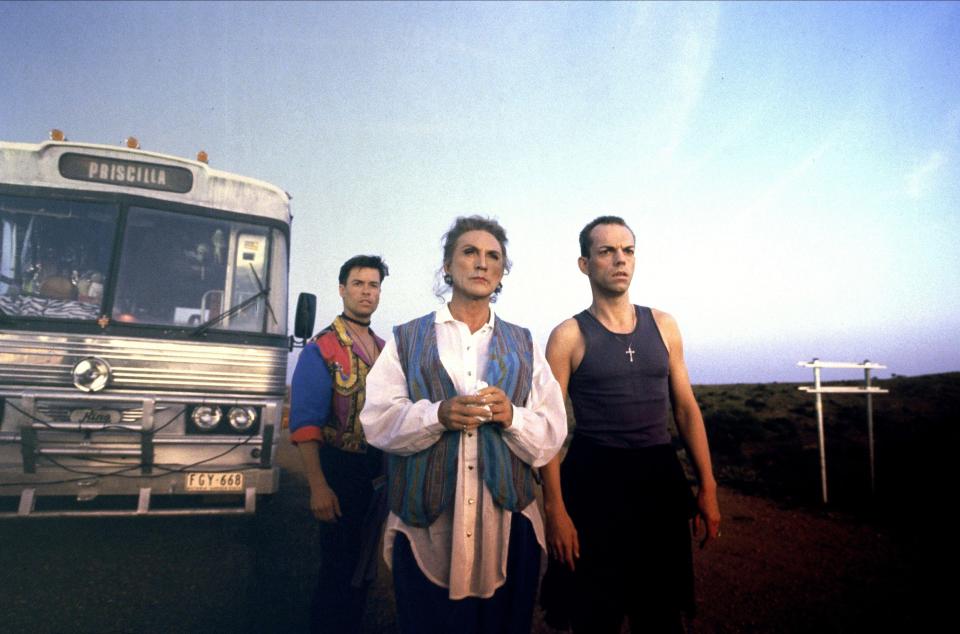 Still from *The Adventures of Priscilla, Queen of the Desert* showing Guy Pearce, Terence Stamp, and Hugo Weaving.
