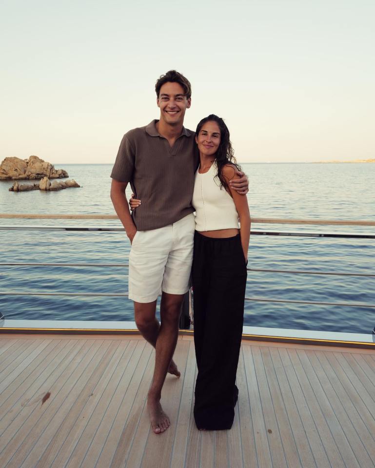George Russell and Carmen Montero Mundt on a yacht.