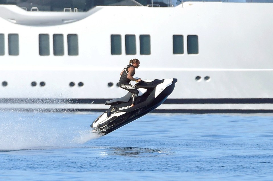 Lewis Hamilton jet skiing.