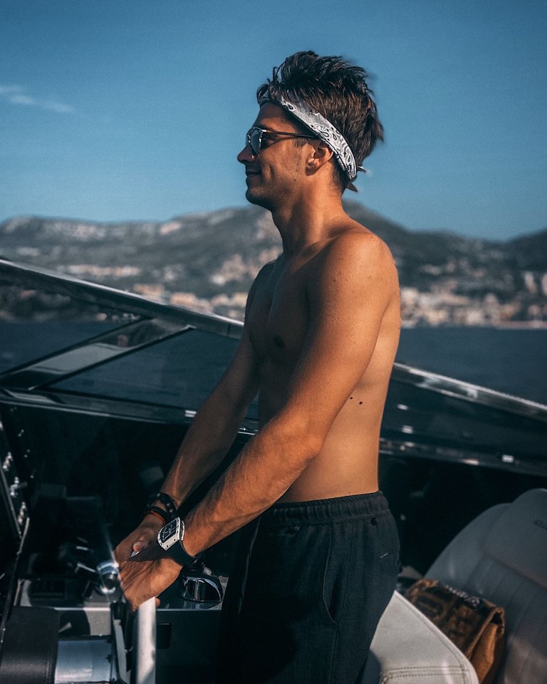 Charles Leclerc on a boat.