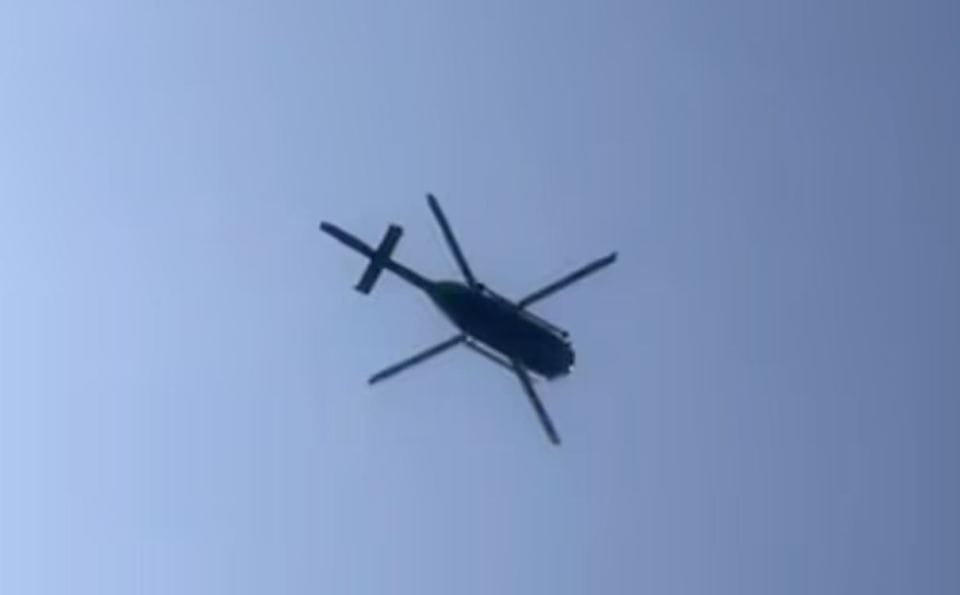 Helicopter flying overhead.
