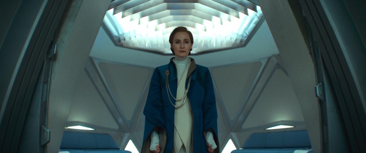 Genevieve O'Reilly in a regal blue robe