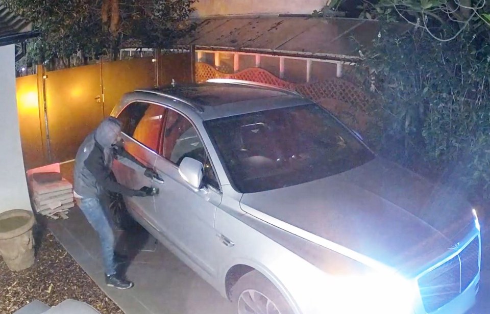 CCTV image of a man stealing a Bentley.