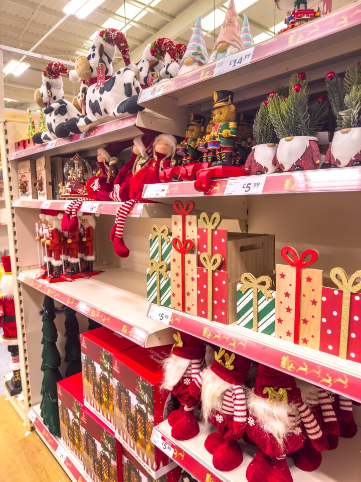 Christmas and Halloween decorations on sale in a store.