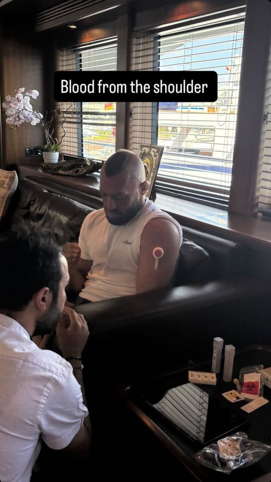 Conor McGregor having a blood sample taken from his shoulder.