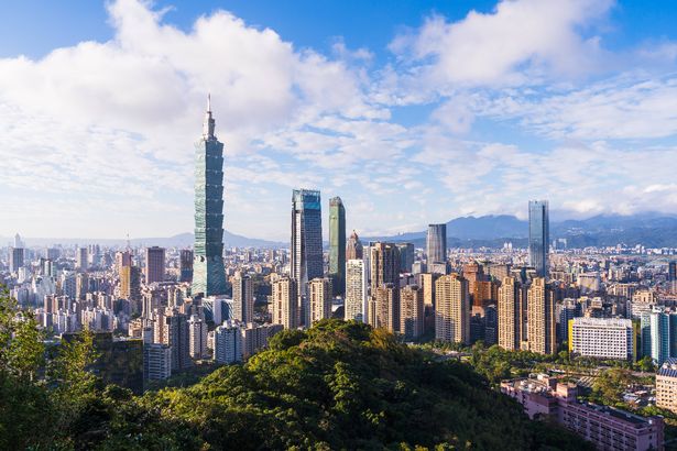 Dense modern buildings in Taipei city financial district during sunset. view from Xiangshan mountain