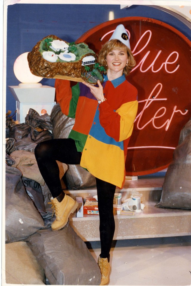 Anthea Turner on Blue Peter holding a model of Tracy Island.