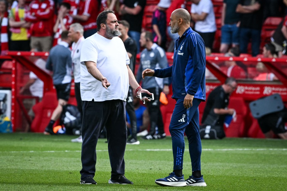 Nottingham Forest's Portuguese manager Nuno Espirito Santo (R) speaks with Nottingham Forest's Greek co-owner Evangelos Marinakis (L) at the end of the English Premier League football match between Nottingham Forest and Leicester City at The City Ground in Nottingham, central England, on May 11, 2025. Nottingham Forest and Leicester City equalise 2 - 2. (Photo by JUSTIN TALLIS / AFP) / RESTRICTED TO EDITORIAL USE. No use with unauthorized audio, video, data, fixture lists, club/league logos or 'live' services. Online in-match use limited to 120 images. An additional 40 images may be used in extra time. No video emulation. Social media in-match use limited to 120 images. An additional 40 images may be used in extra time. No use in betting publications, games or single club/league/player publications. /  (Photo by JUSTIN TALLIS/AFP via Getty Images)