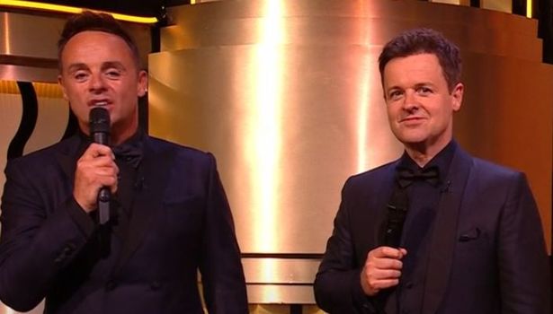 Ant and Dec on stage holding microphones