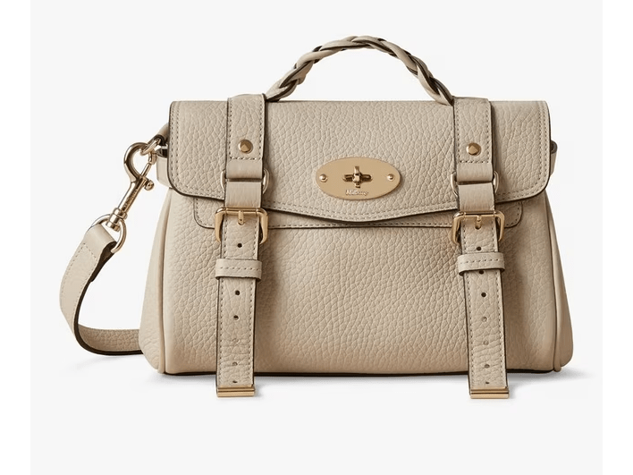 Beige Mulberry handbag with braided handle and gold buckles.