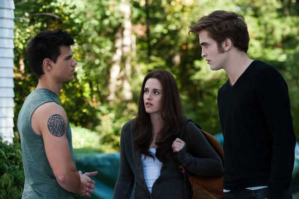 Actors Taylor Lautner, Kristen Stewart and Robert Pattinson in the movie Twilight 