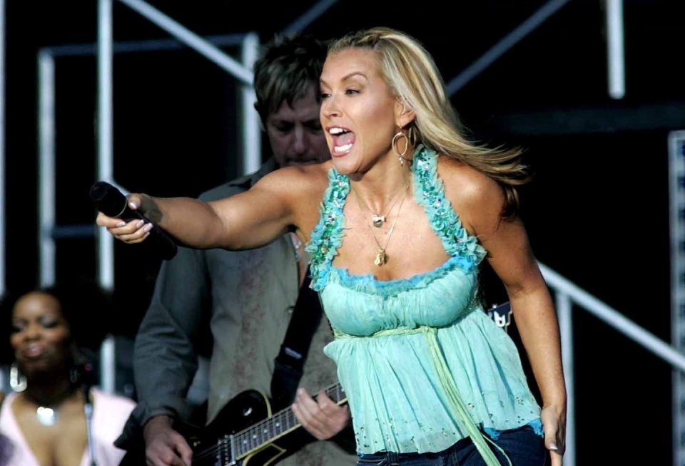 Anastacia performing on stage.