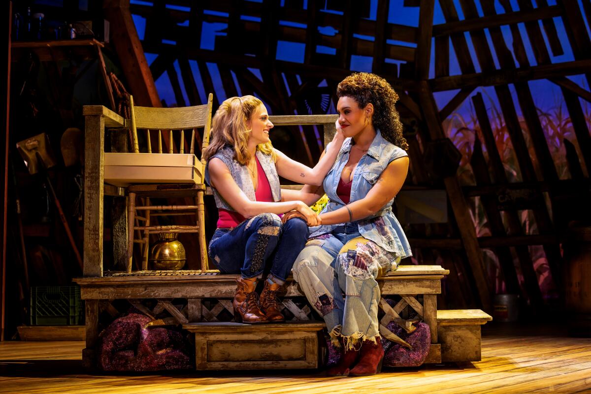 Danielle Wade as Maizy, left, and Miki Abraham as Lulu in the North American Tour of "Shucked" 